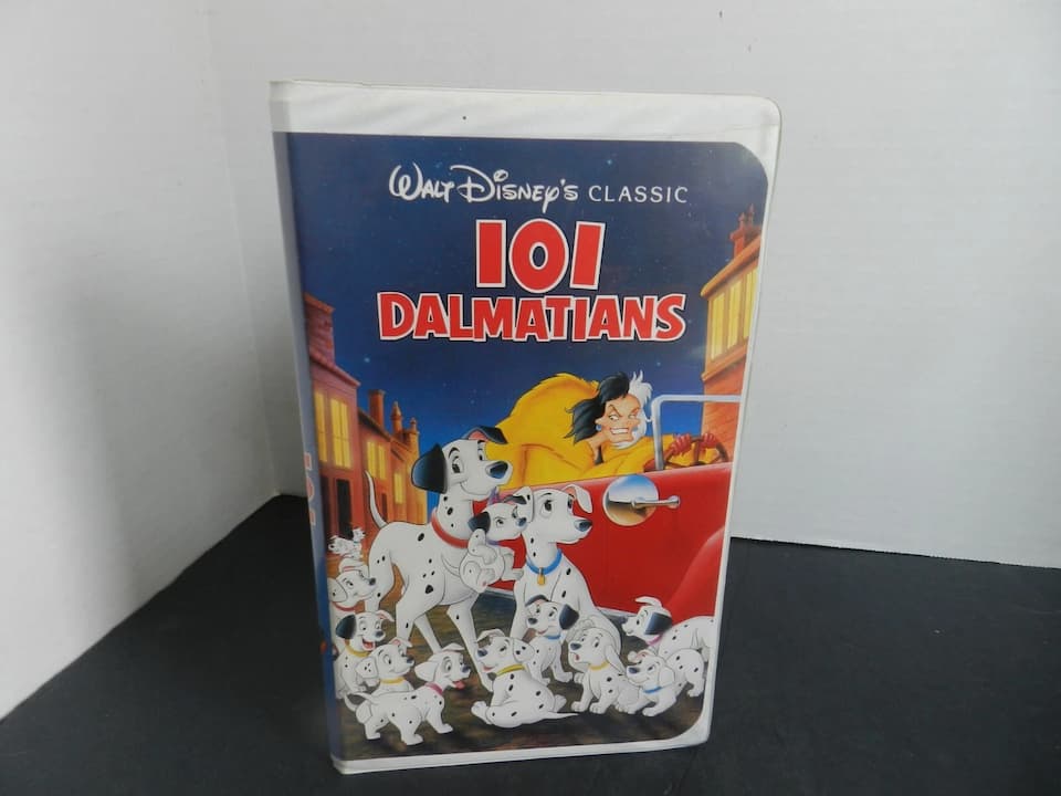 101 Dalmatians Black Diamond Edition VHS, white cover with spotted puppies, Pongo and Perdita centered, Cruella in background, clamshell case and tape shown