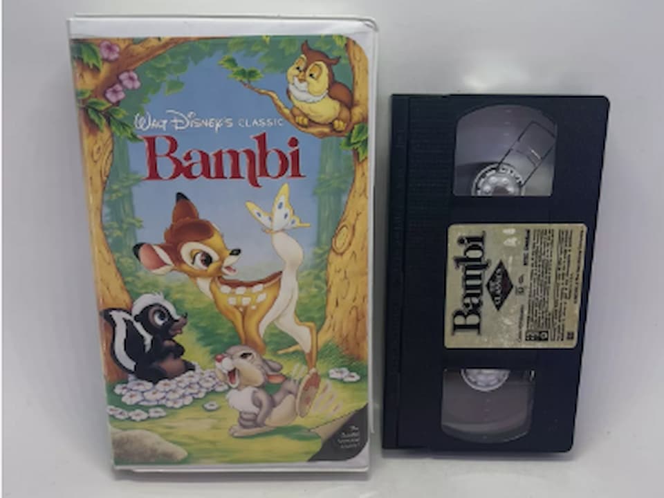 Bambi Black Diamond Edition VHS, clamshell case, Bambi standing in a forest, vibrant nature background, classic Disney title text