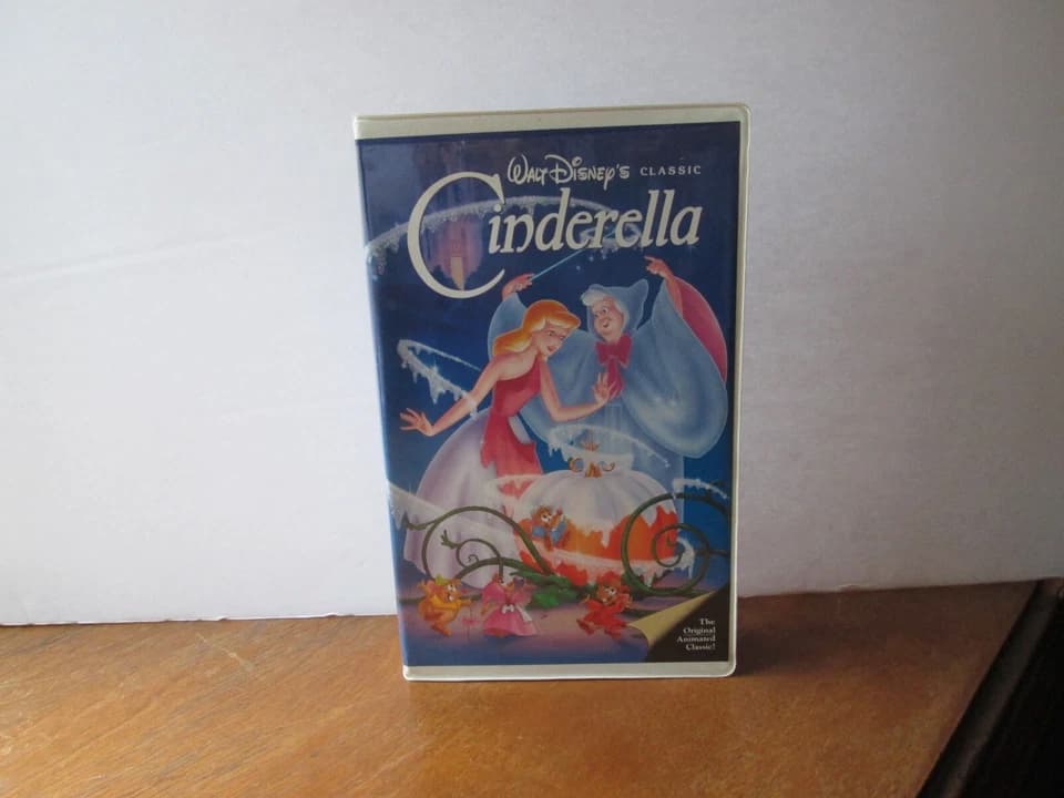 Cinderella Black Diamond Edition VHS, blue cover, Cinderella in ball gown, castle in background, clamshell case with tape visible