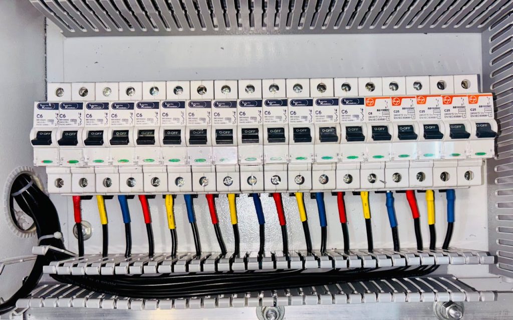 Electrical Circuit Breaker Panel with Color-Coded Wiring