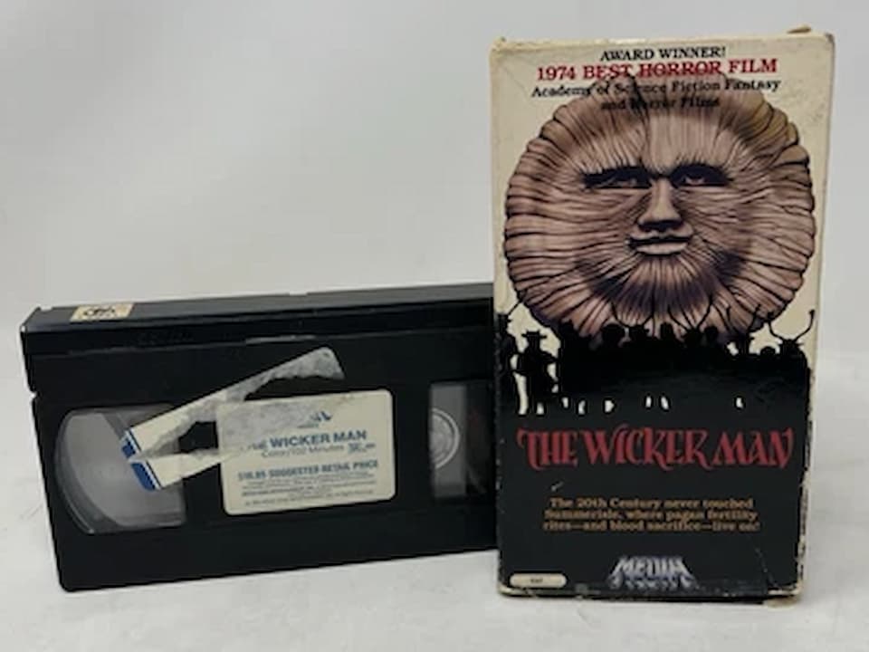 The Wicker Man (1986 Thorn EMI release) VHS tape, black clamshell case, eerie burning wicker effigy on the cover, red and white title text, Thorn EMI logo at the bottom, vintage horror presentation