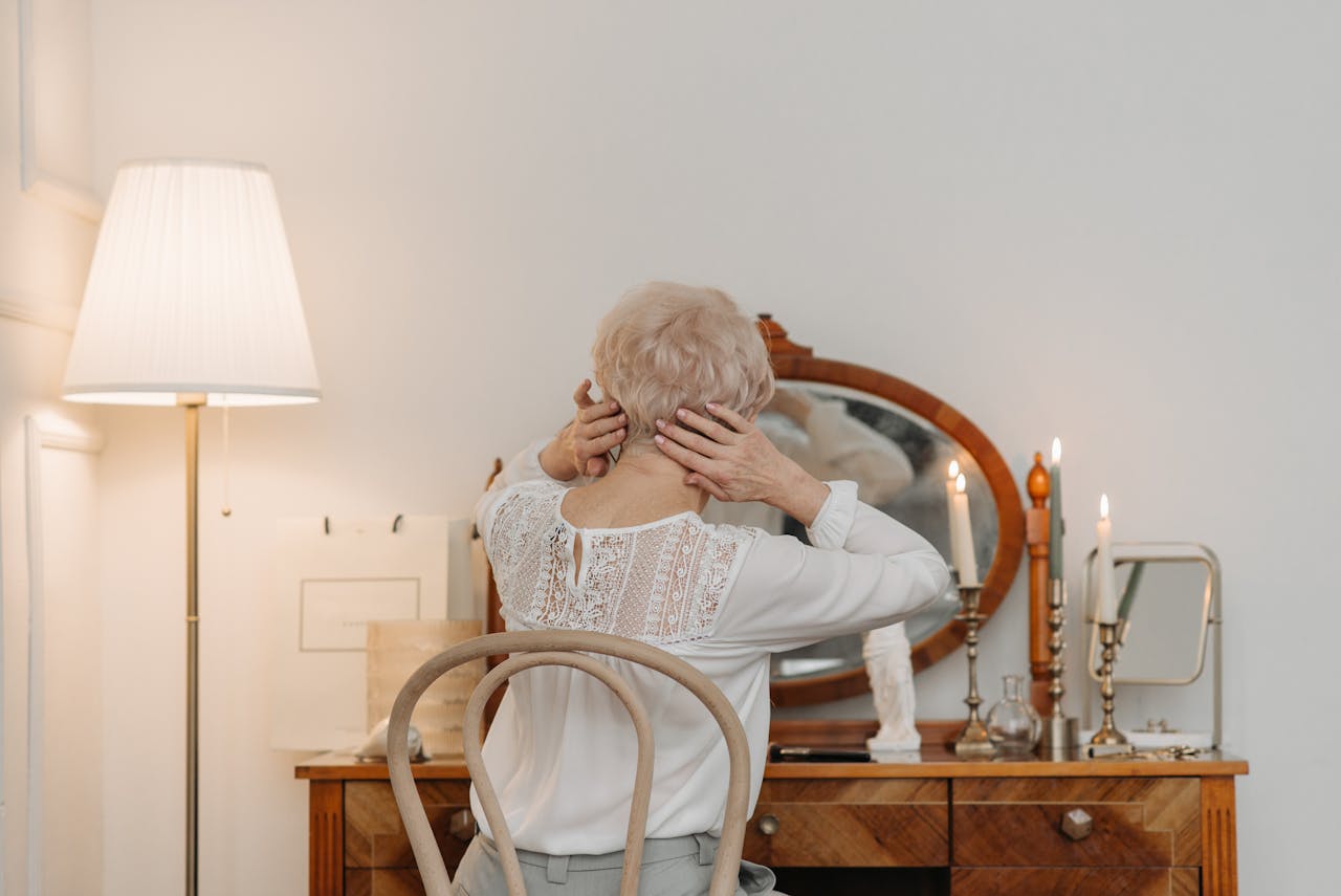 Back View of a Woman with Her Hands on Her Head