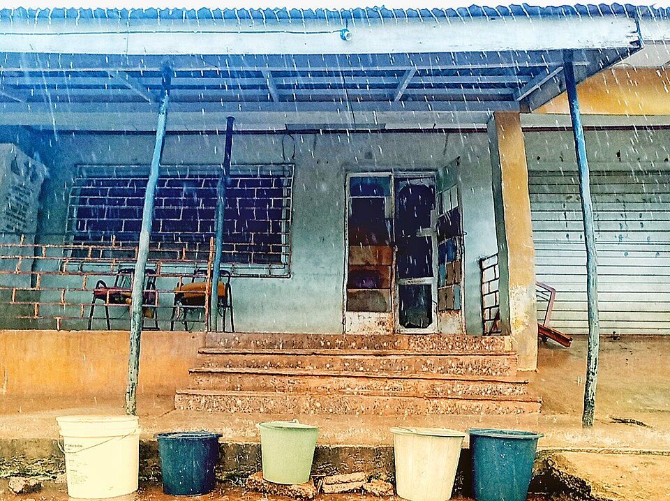 collecting rain water in bucket