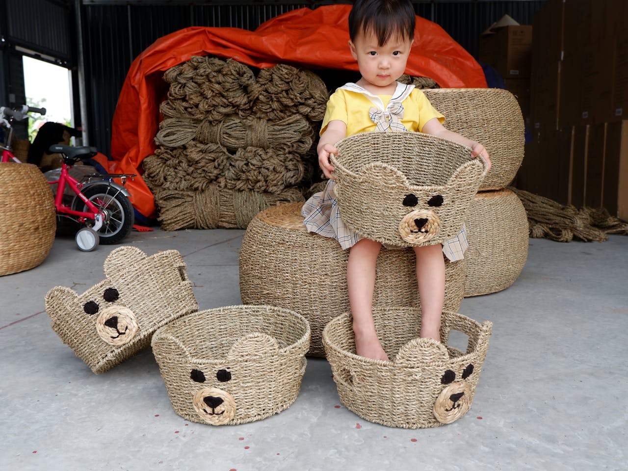A Girl Holding a Woven Basket