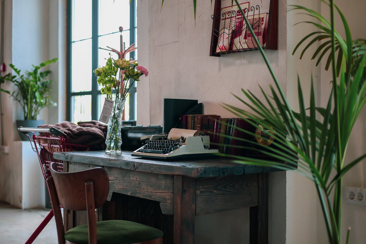 Cozy Vintage Workspace with Typewriter and Plants
