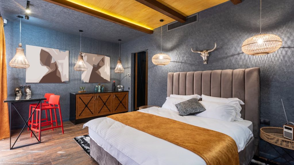 Modern bedroom interior with decoration and shiny lamps