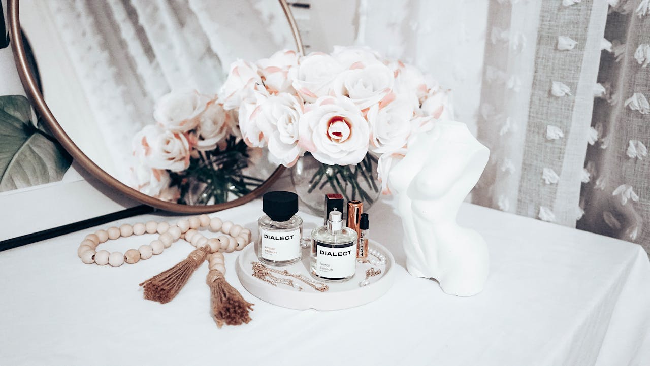 Perfumes and Flowers next to the Mirror