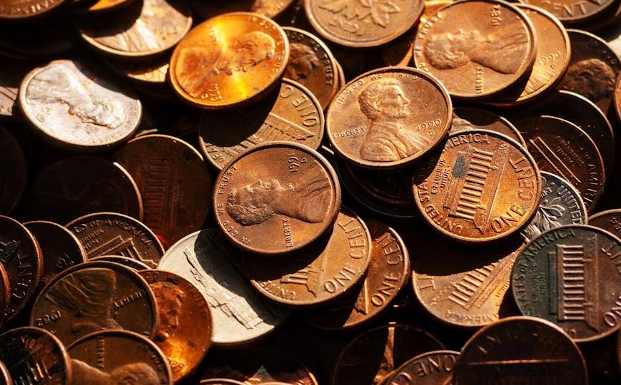 High-resolution image showcasing a pile of mixed coins representing financial concepts.