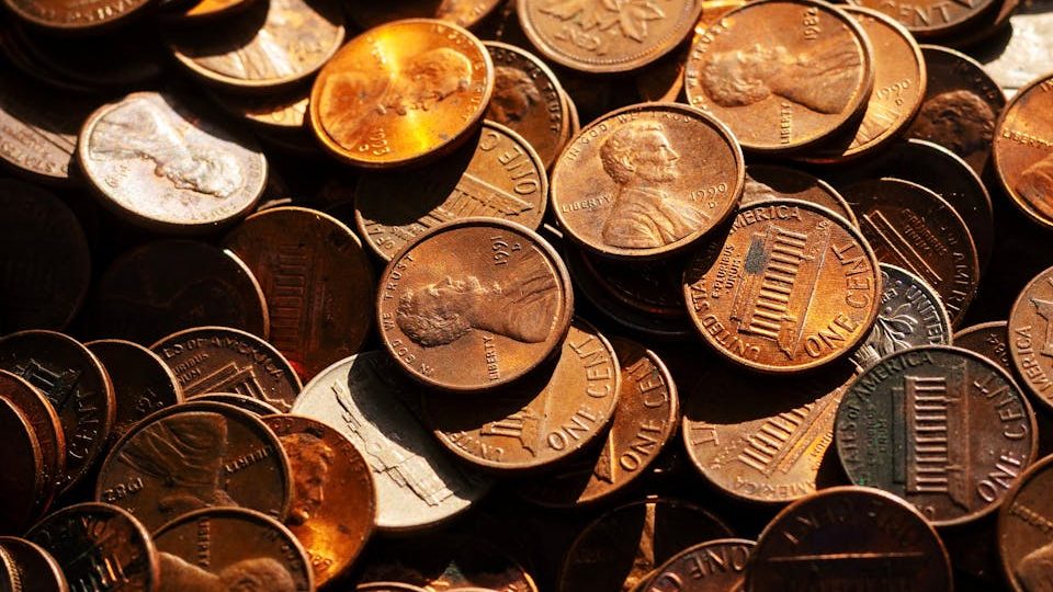 High-resolution image showcasing a pile of mixed coins representing financial concepts.