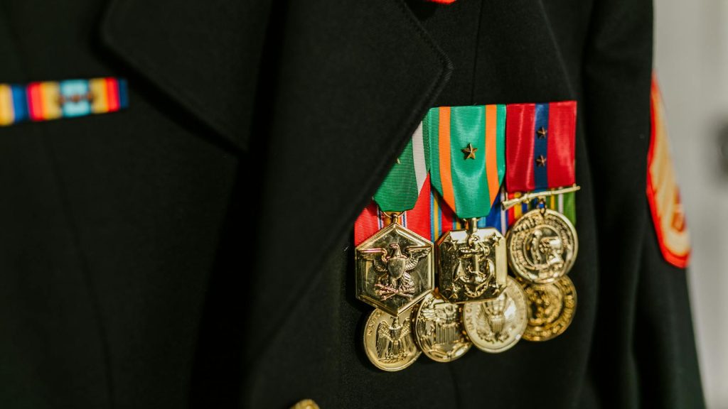 Close-up of a military uniform with vibrant medals representing honor and recognition.