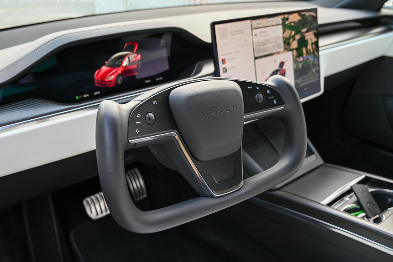 Steering Wheel and Screens in Tesla Car Interior