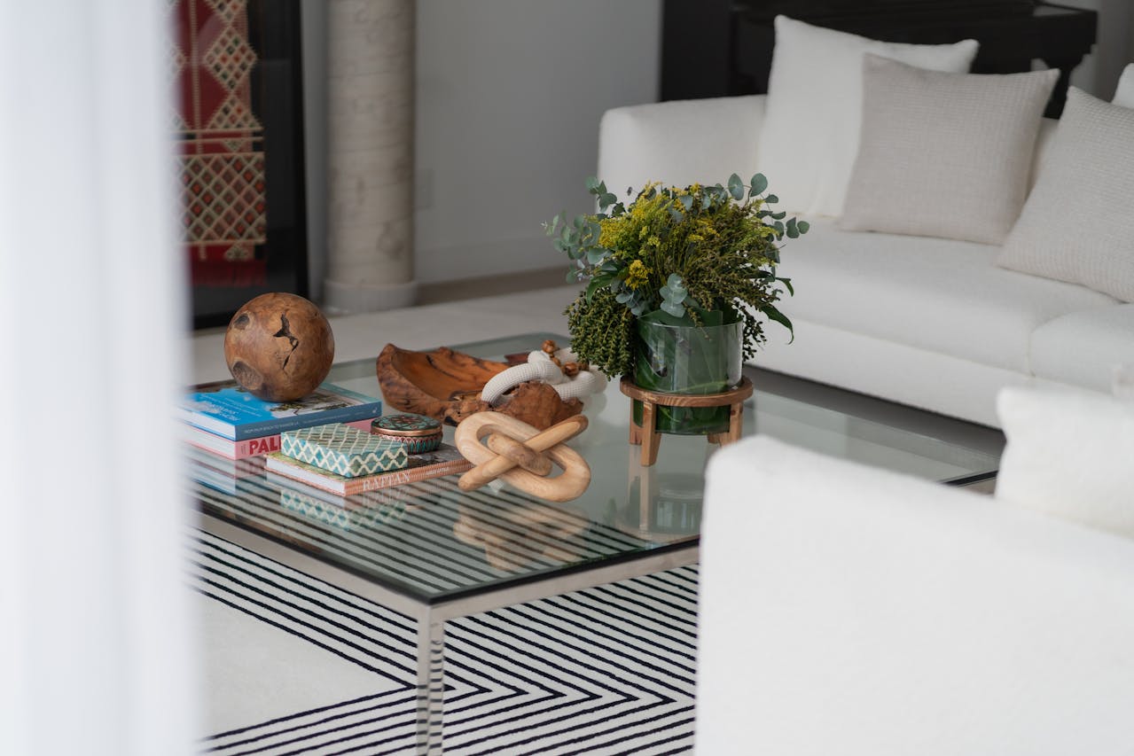 Flowers, Book and Wood Decor on Coffee Table