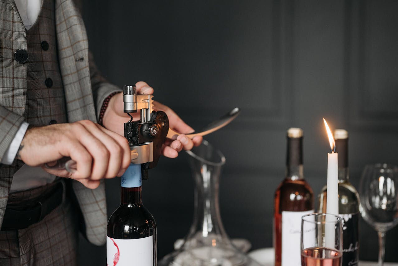 Person Holding a Corkscrew