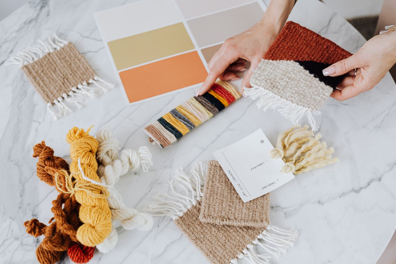 Top View of Woman Holding Knitwork Decorations