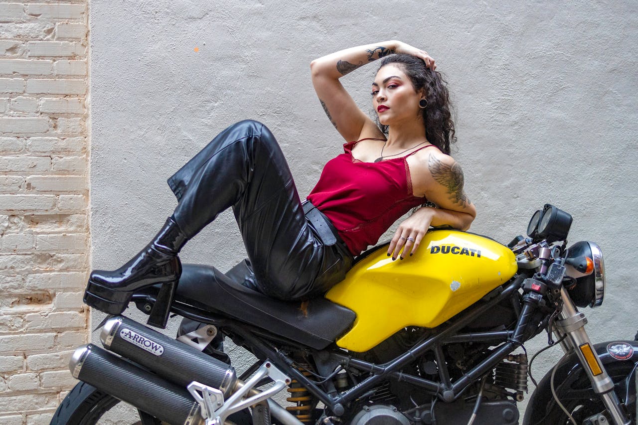 Woman Posing on Yellow Ducati Monster