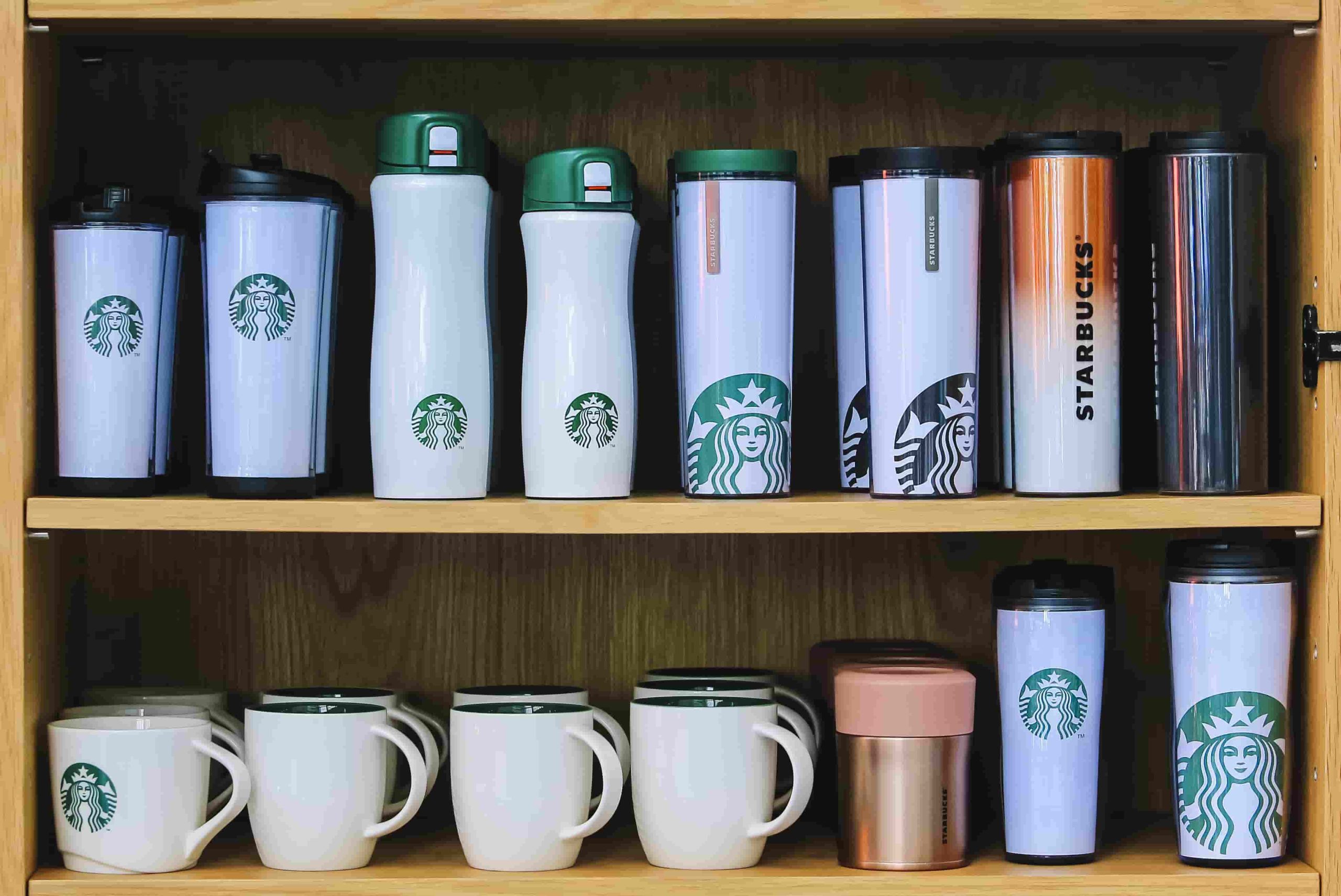 Starbucks drinkware. Assortment of Starbucks branded and logo drinkware including season's cups, Cold Cups, Mugs, Travel Mugs, Water Bottles And Tumblers.
