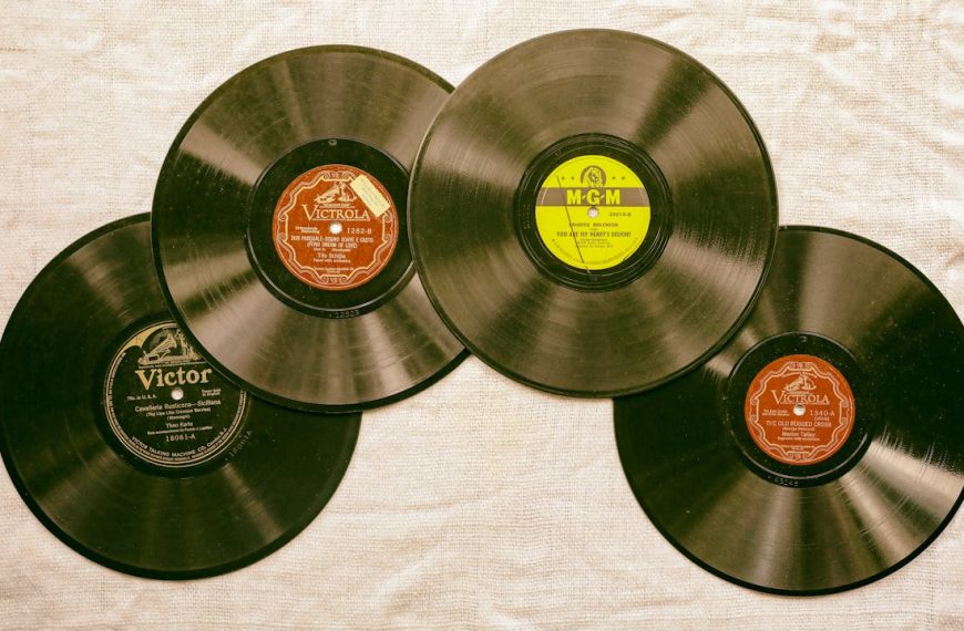 Photo of Vinyl Records on a White Textile