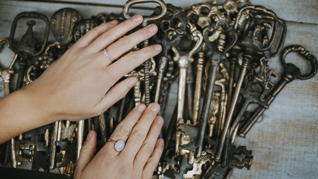Person Holding Big Skeleton Keys