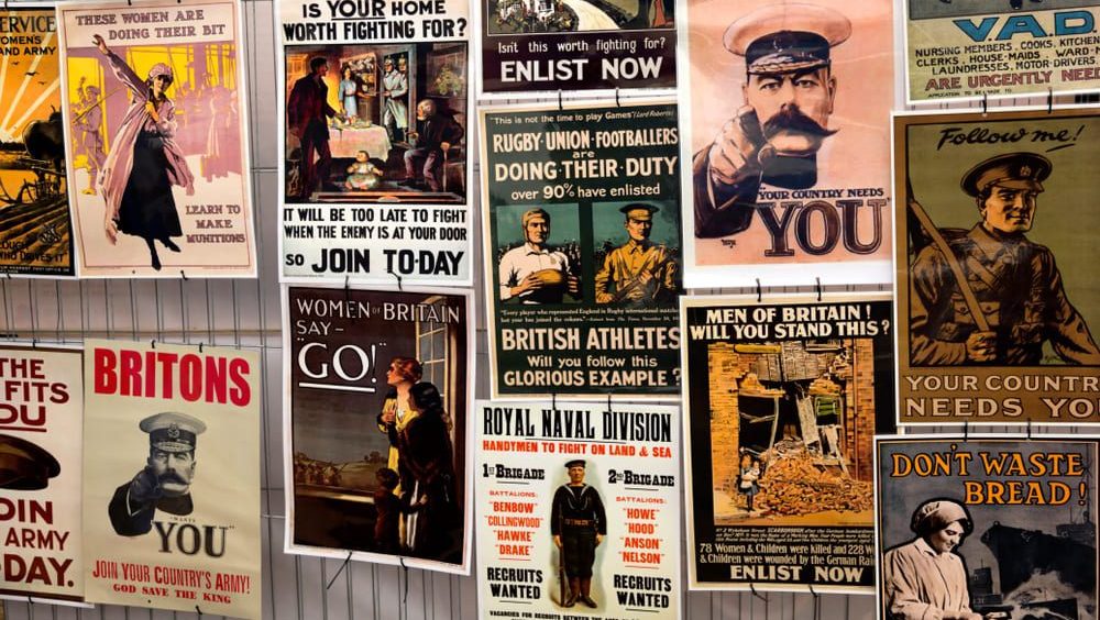 A display of reproduced posters at the World War One Centenary Commemoration display, Great Dorset Steam Fair, Blandford, Dorset, United Kingdom, 2014.