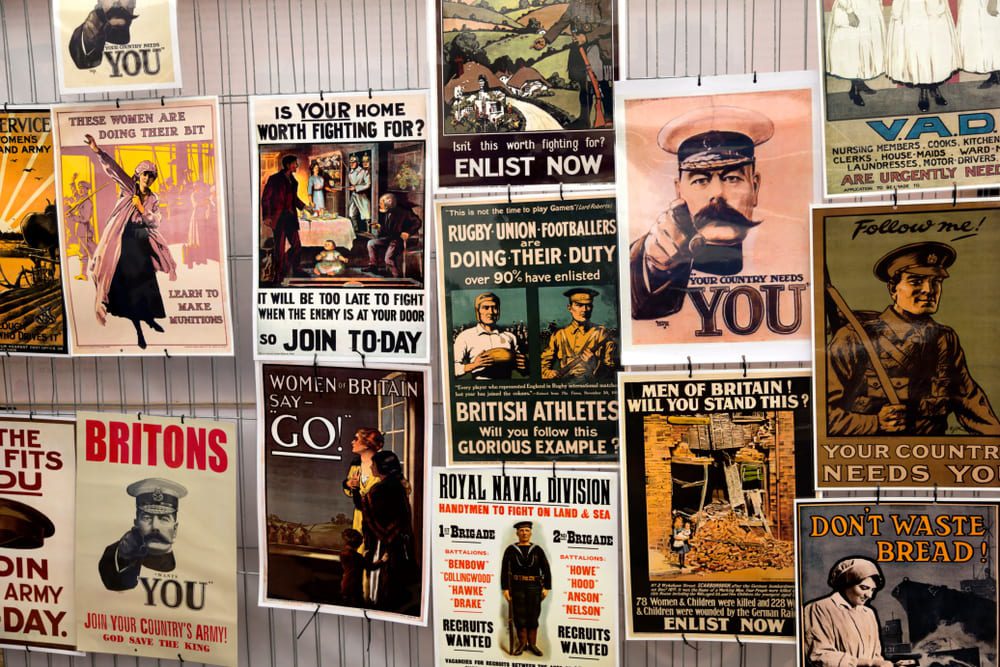 A display of reproduced posters at the World War One Centenary Commemoration display, Great Dorset Steam Fair, Blandford, Dorset, United Kingdom, 2014.