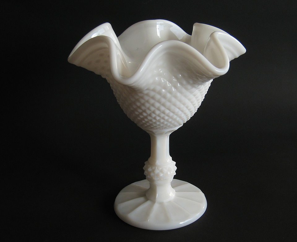 Decorative pedestal milk glass bowl