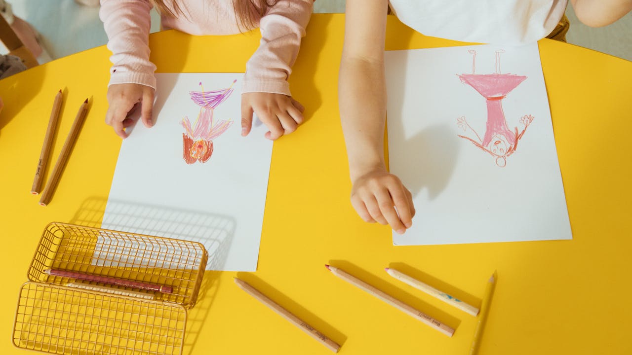 Kids Drawing on White Sheets