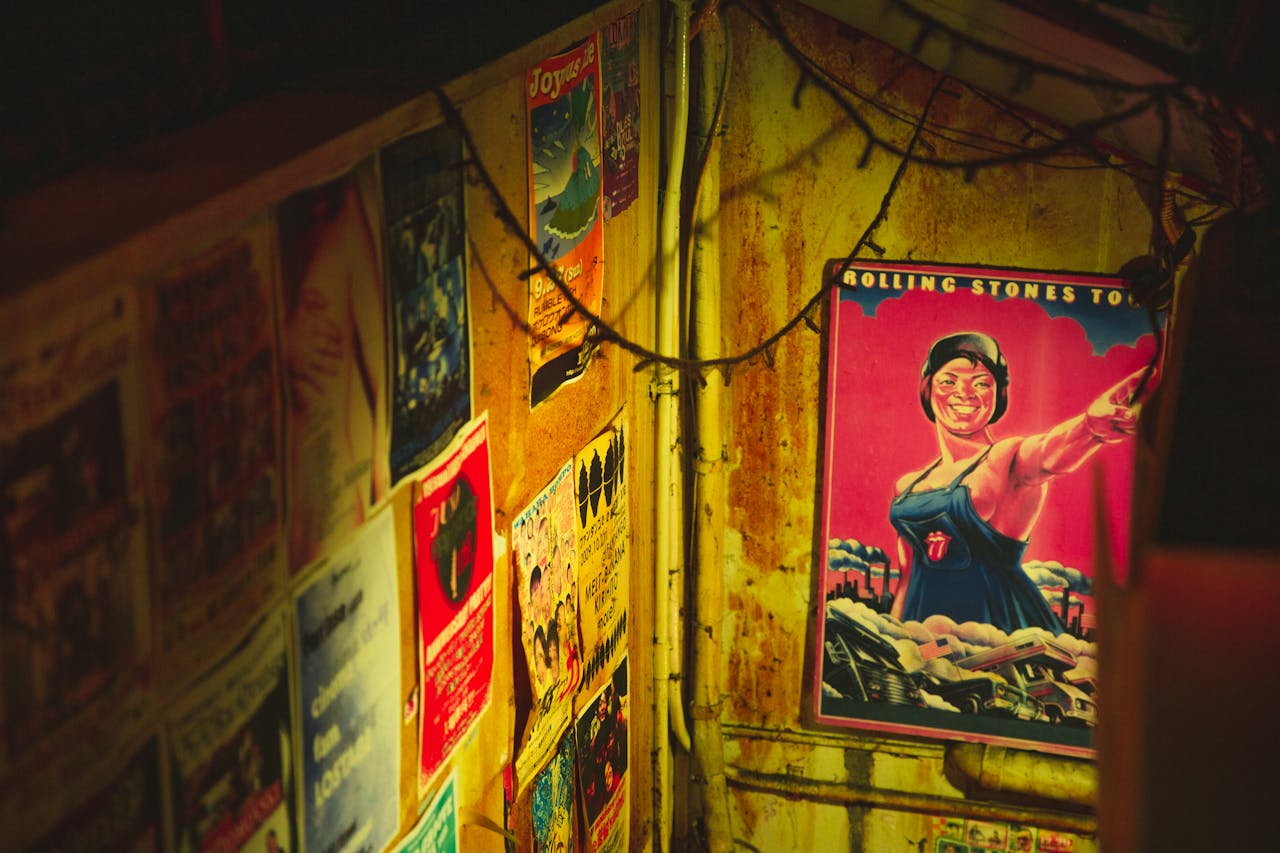 Vintage posters and on shabby rusty wall