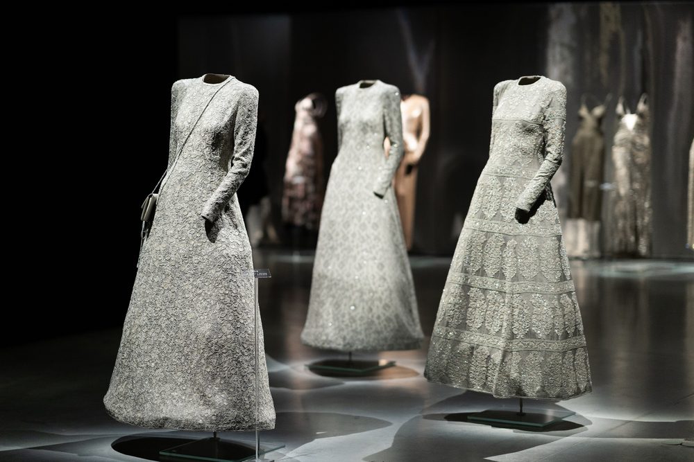 Italy, Milan - 04 December, 2022: Permanent exhibition space with luxury dresses and costumes. Armani Silos, the fashion art space in Milan dedicated to the Armani style. Armani dresses.