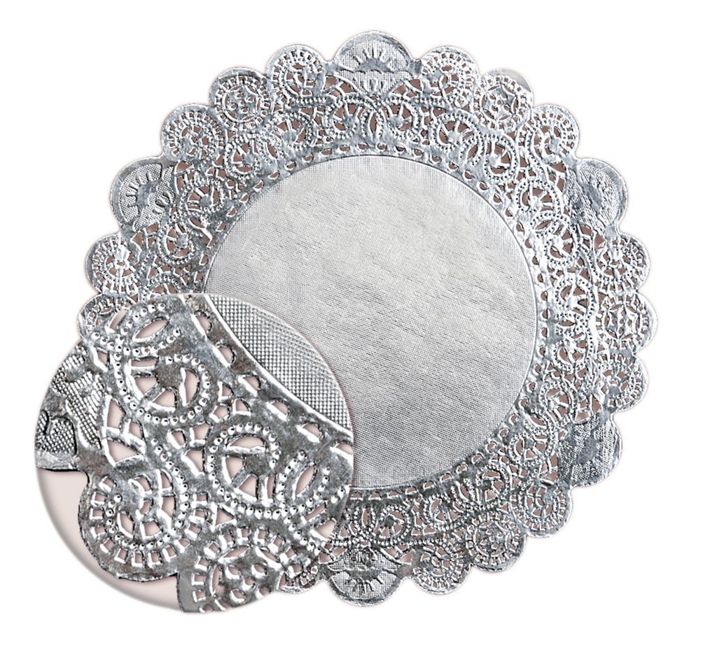 Silver confectionery napkin with decorative texture under magnifying glass. Delicate napkin isolated over white background