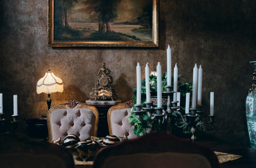 Sophisticated vintage dining room featuring elegant decor, candleholders, and classic artwork. Perfect for a luxurious setting.