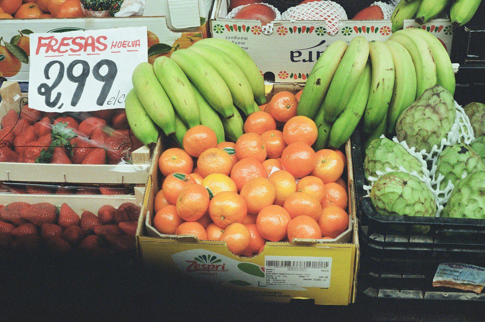 A display of fruits and vegetables at a grocery store