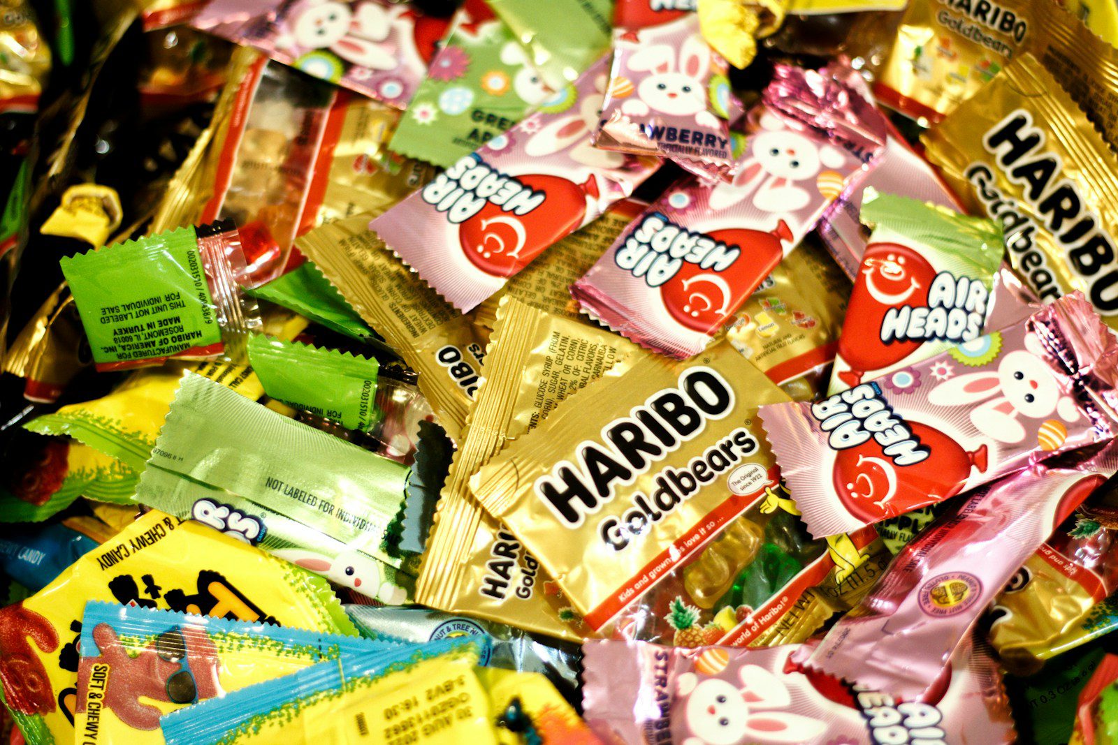 a pile of various types of candy