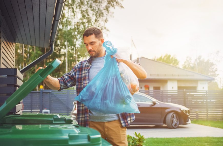 Man garbage bag trash can