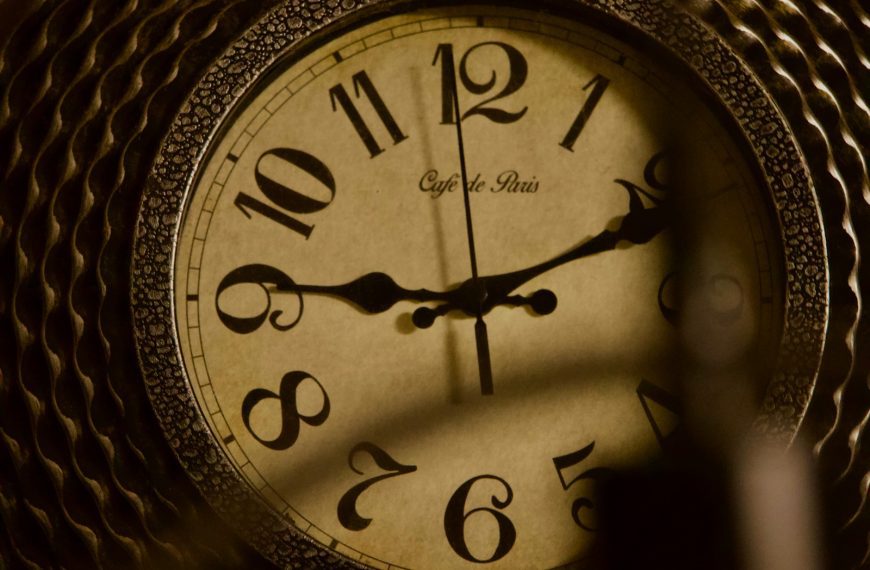 A close up of a clock on a table