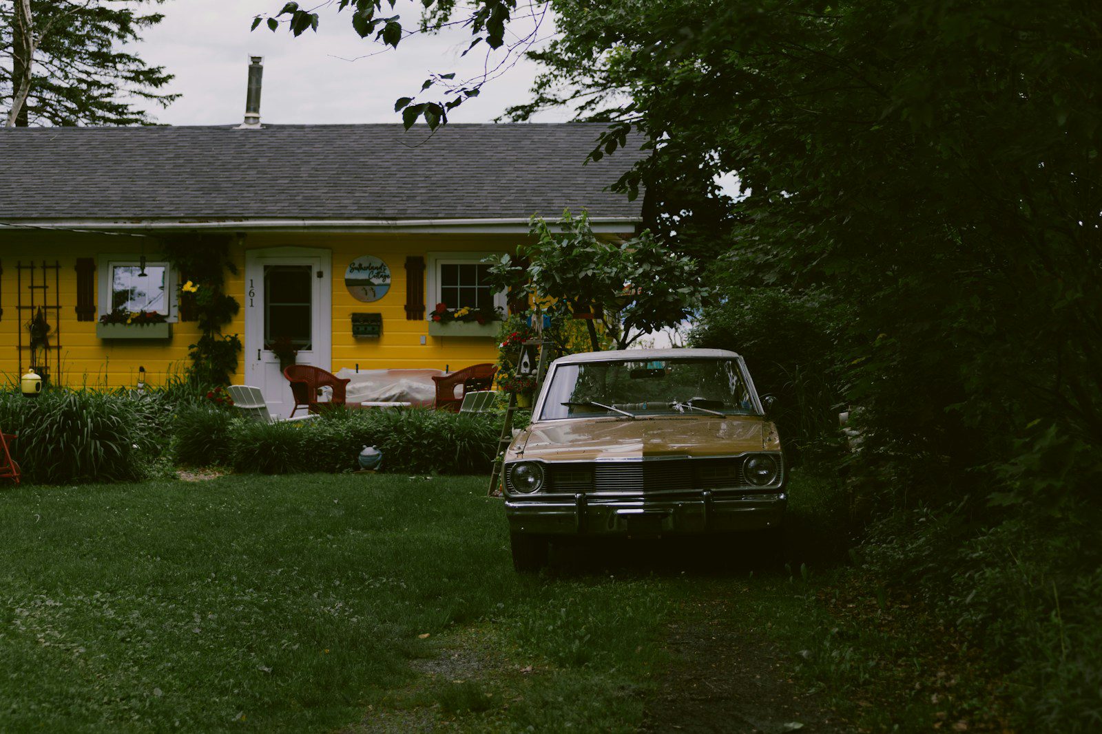 a car parked in front of a house