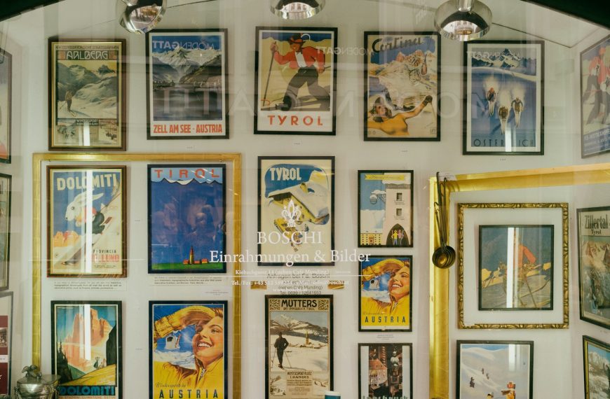 a wall with many pictures on it