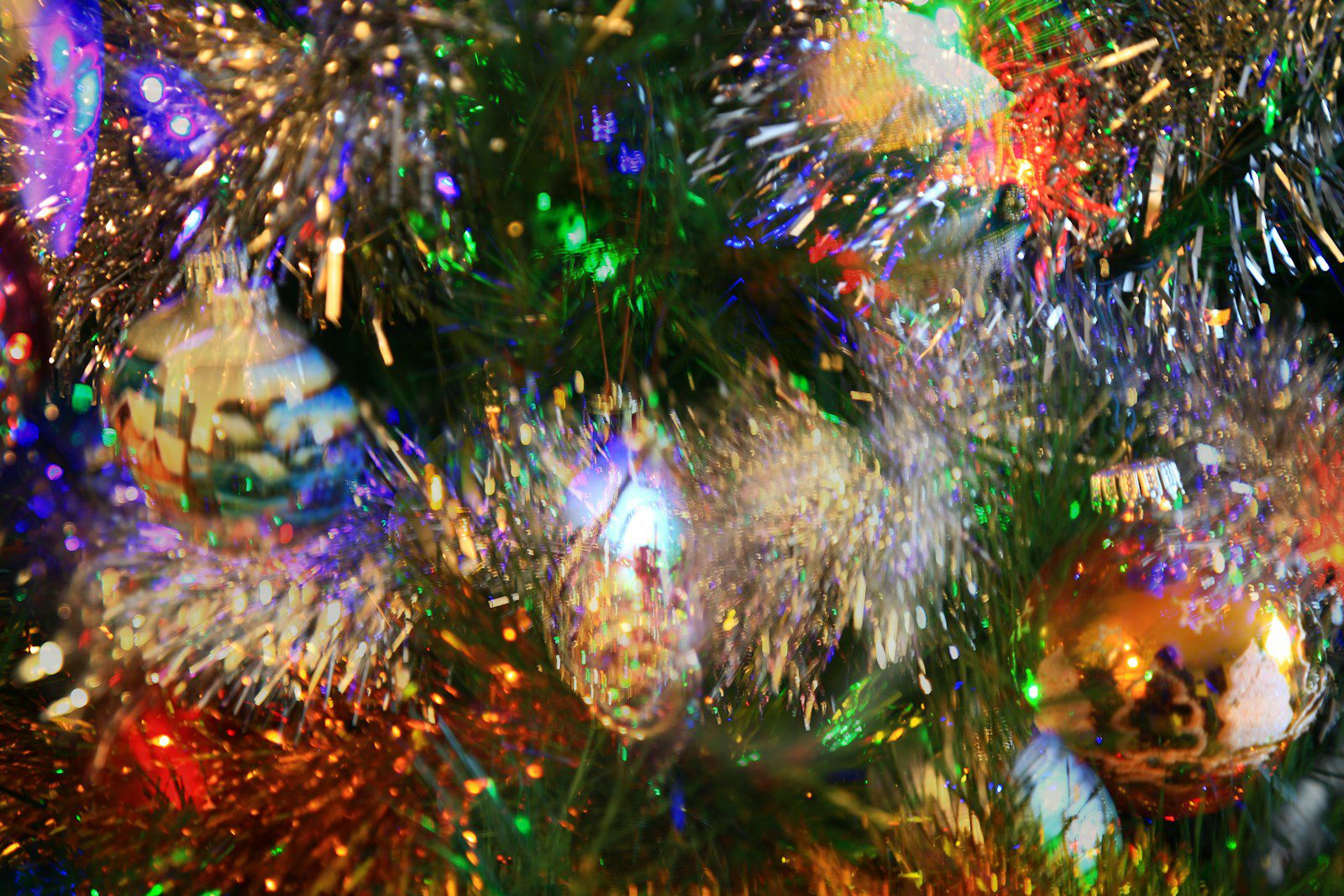 a close up of a christmas tree with lights