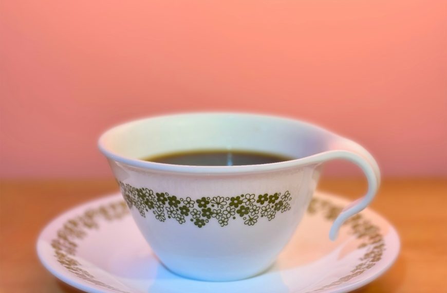 A cup of coffee sitting on top of a saucer