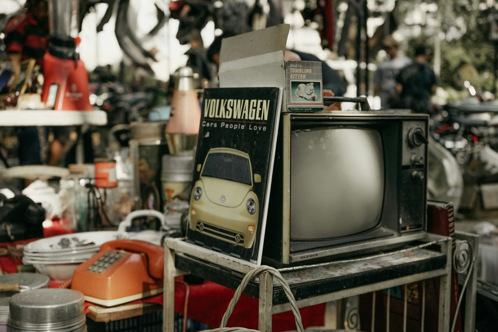 vintage black CRT TV on rack