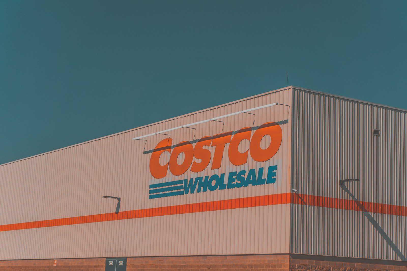 a building with a sign that says costco whole sale