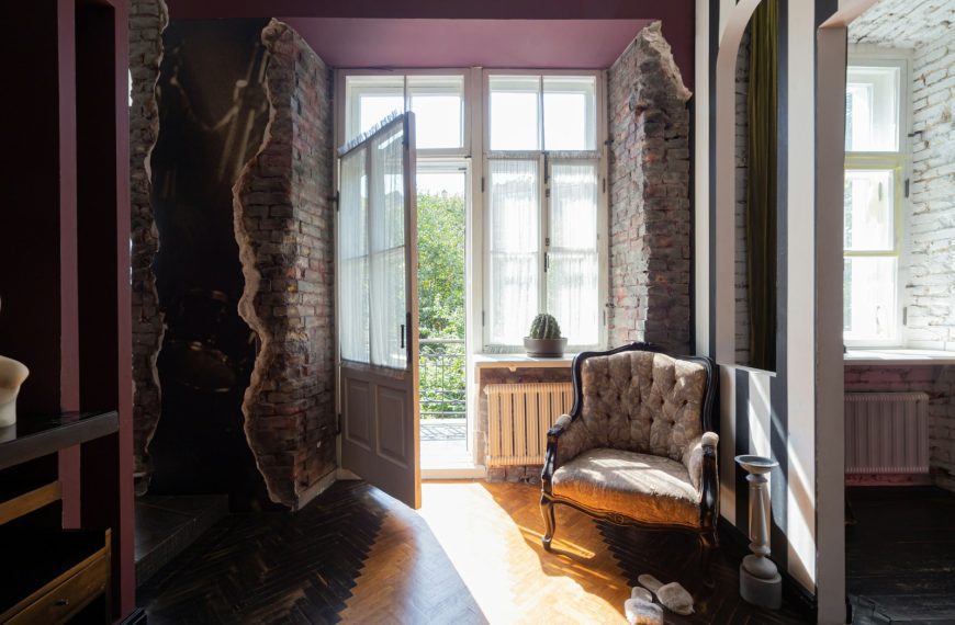 A living room with a couch and a chair