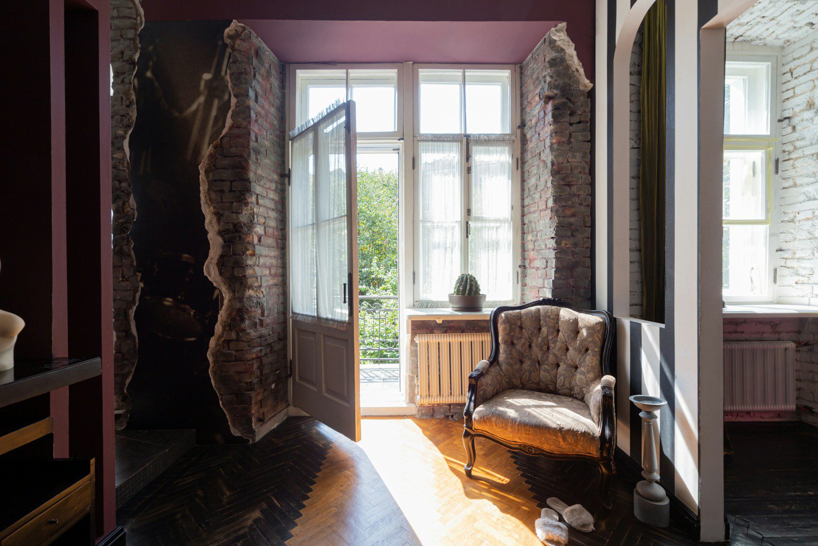 A living room with a couch and a chair