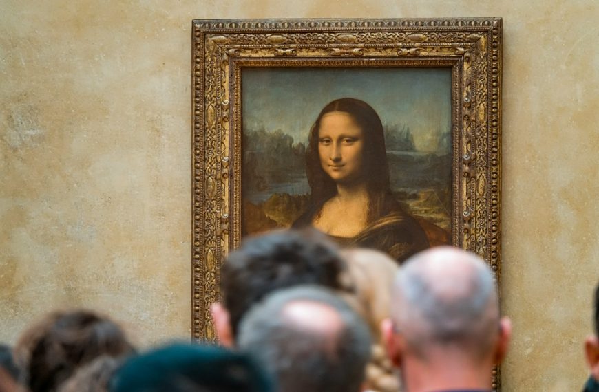 woman in black top standing near people