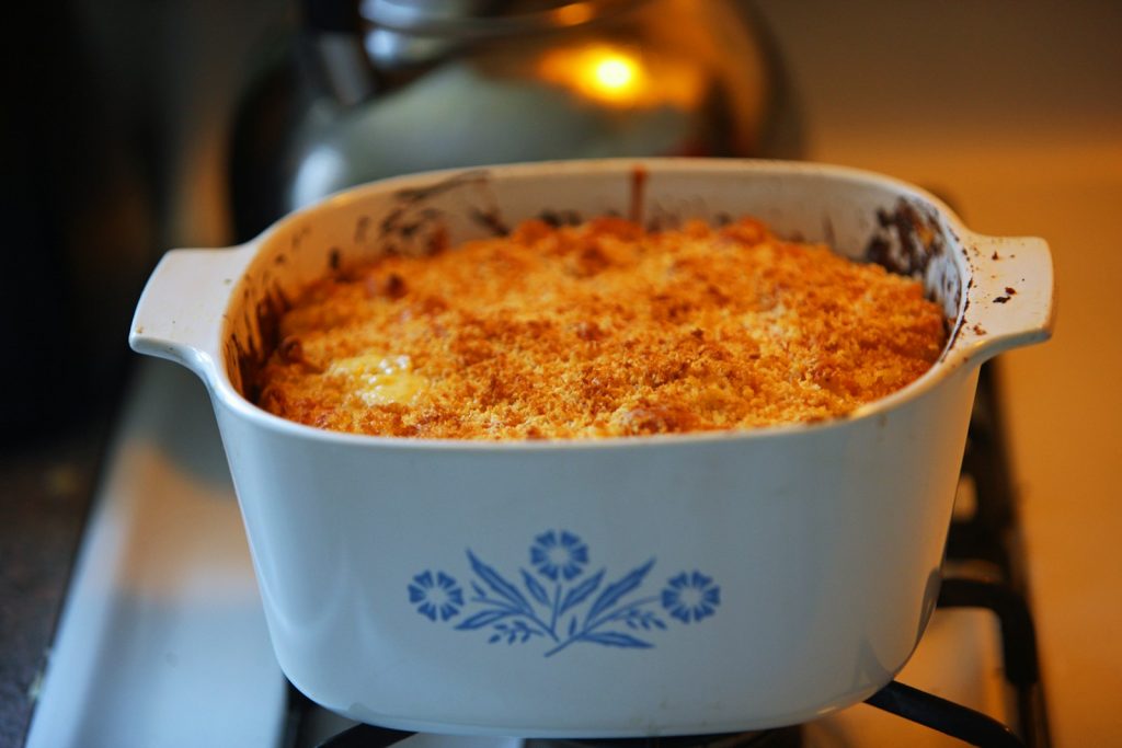 a casserole dish sitting on a stove top