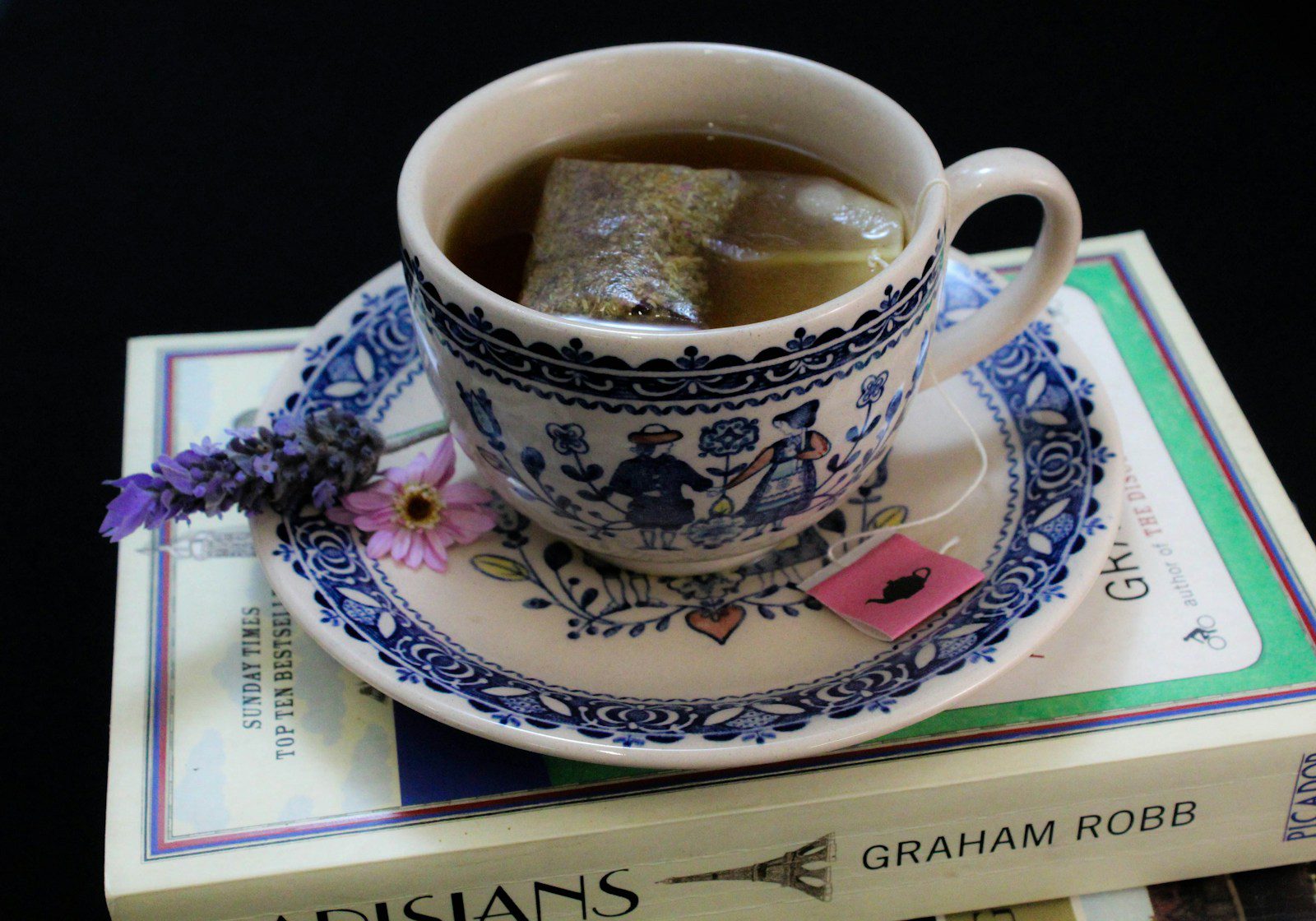 a cup of coffee on a book