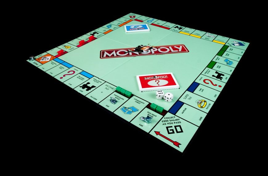 a monopoly board game on a black background