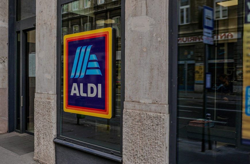 a store front with a large ad on it