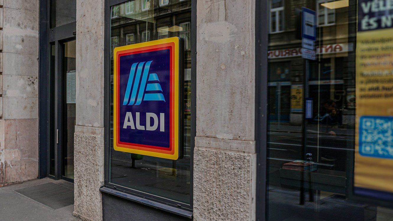 a store front with a large ad on it