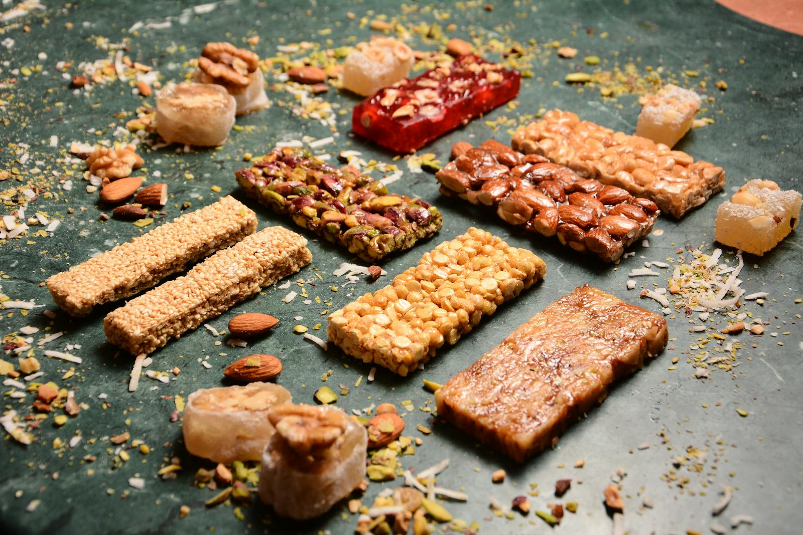 A variety of nut and seed bars showcasing delicious textures and flavors.
