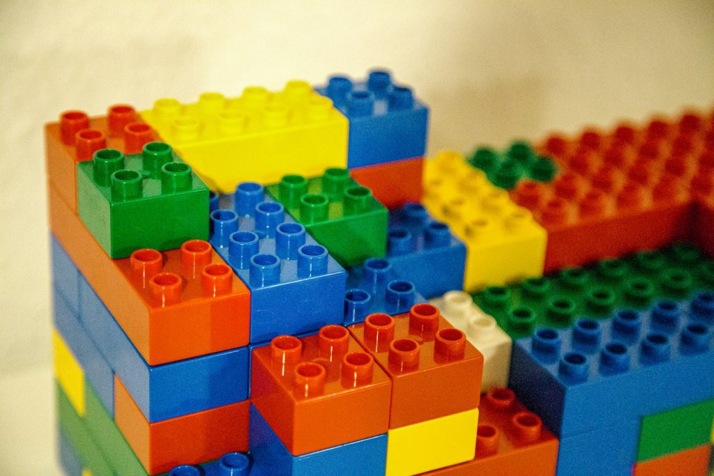a stack of legos sitting on top of a table